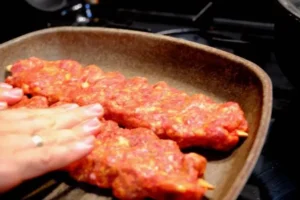Turkish Adana Kebab Recipe: Spicy Grilled Perfection 3 shape the kebab