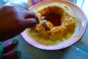 Hummus Without Tahini Recipe | Creamy & Easy Mediterranean Dip 4 Step 4: Taste the hummus. Add more salt or lemon juice if needed. If too thick, add water 1 tablespoon at a time and blend for 10 seconds.